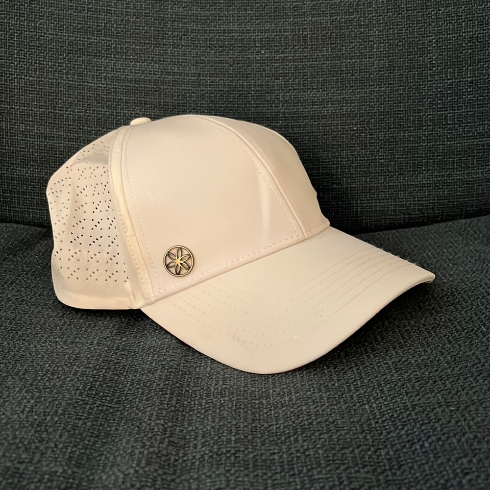 Bright white Gaiam hat, never worn in perfect condition with tag.
